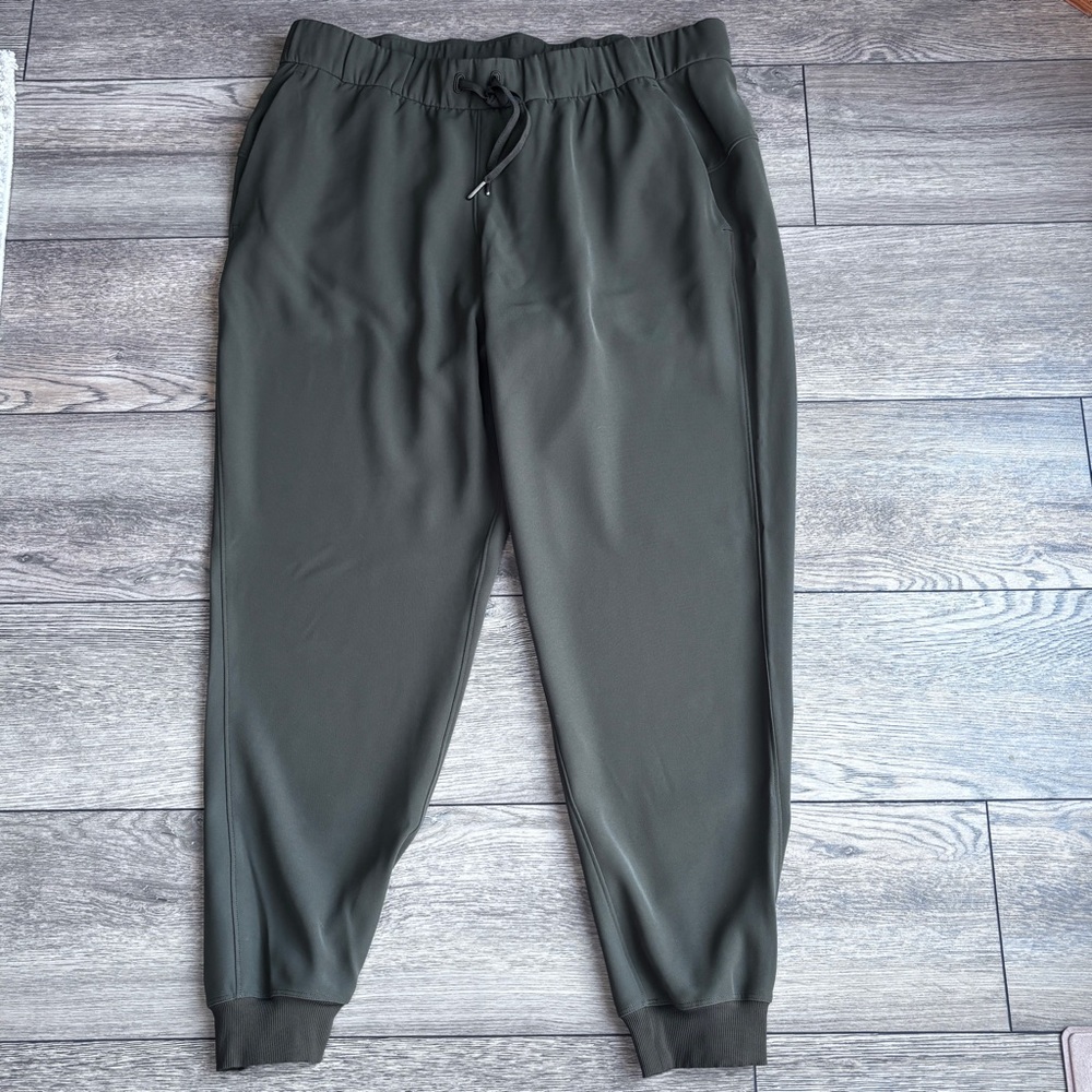 Lululemon On The Fly Jogger Pants Olive Green Drawstring Pockets Sz 12